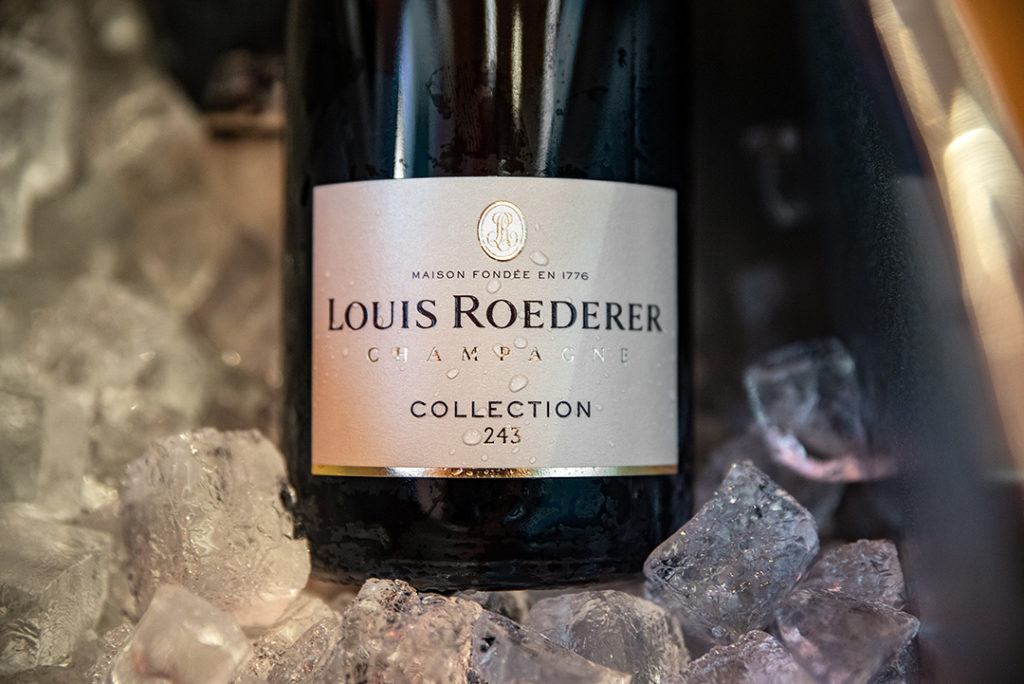 Roederer Collection 243 champagne bottle in the ice cooler