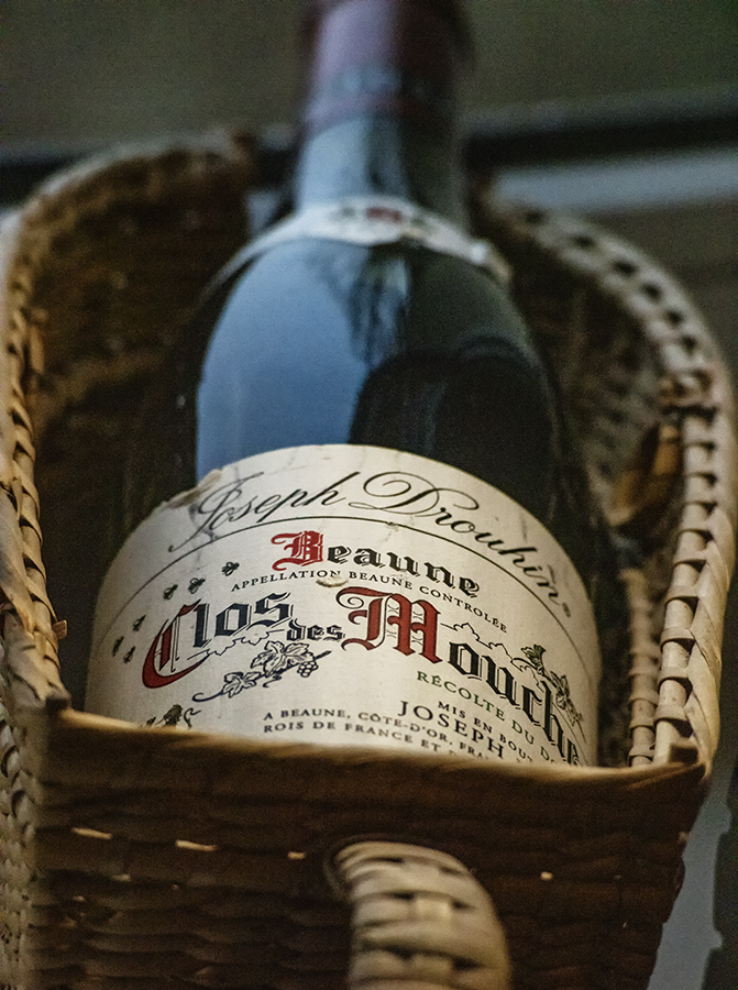 A bottle of Beaune 1er Cru Clos des Mouches by Joseph Drouhin
